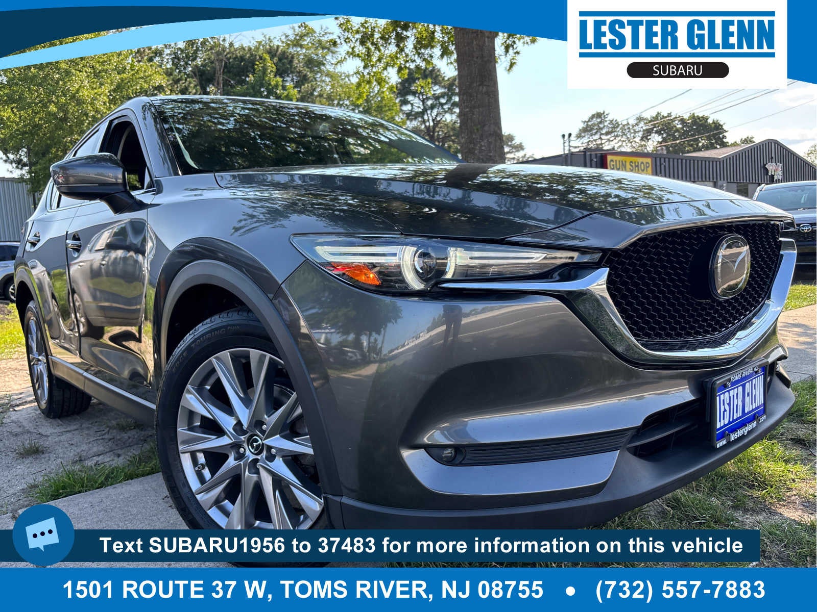 2019 Mazda Mazda CX-5 Grand Touring in Machine Gray Metallic — front three-quarter view